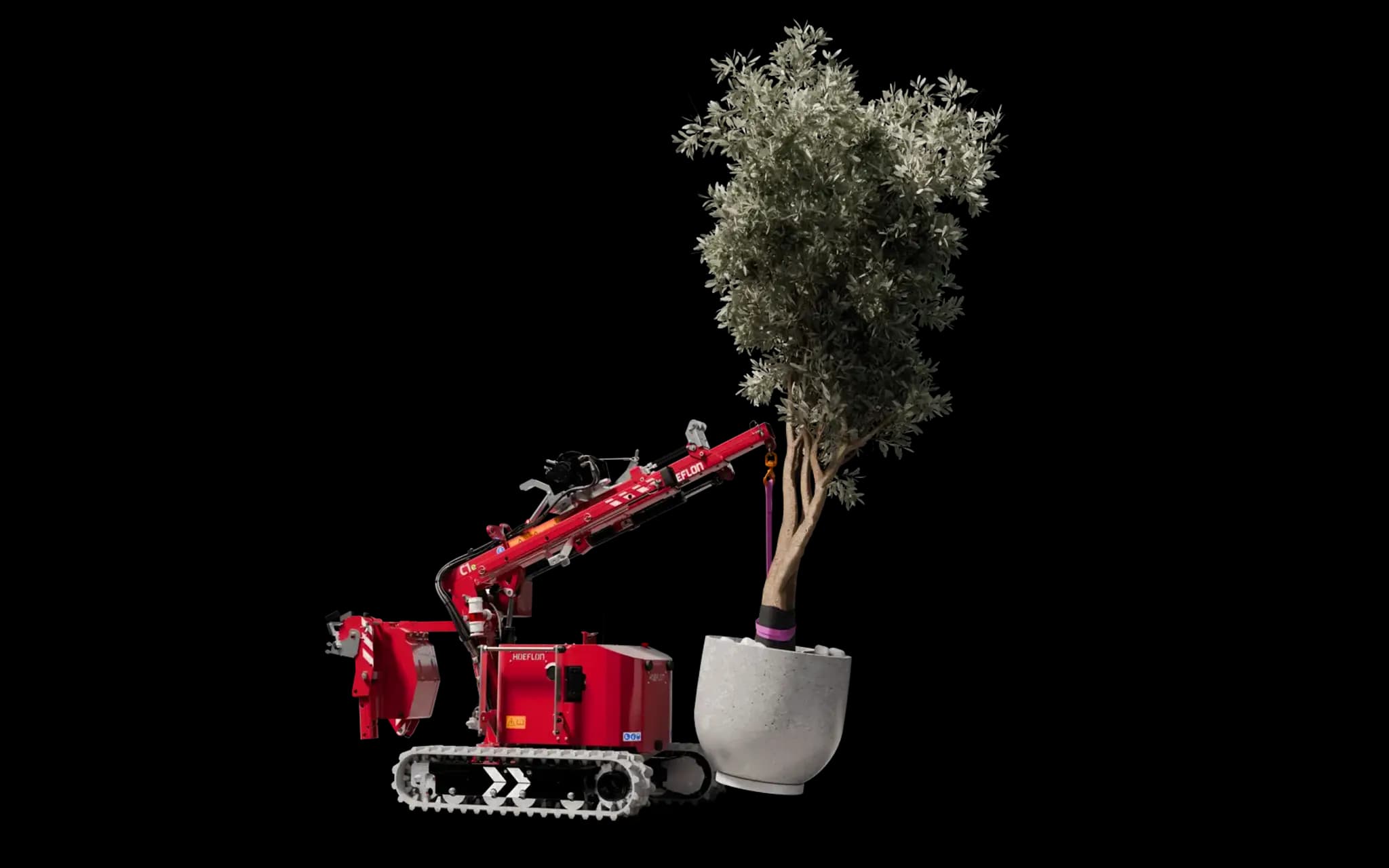 Image of the Hoeflon C1 crane in pick-and-carry mode with an olive tree.